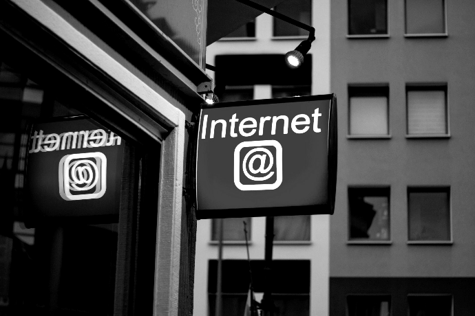 Internet LED signage beside building near buildings